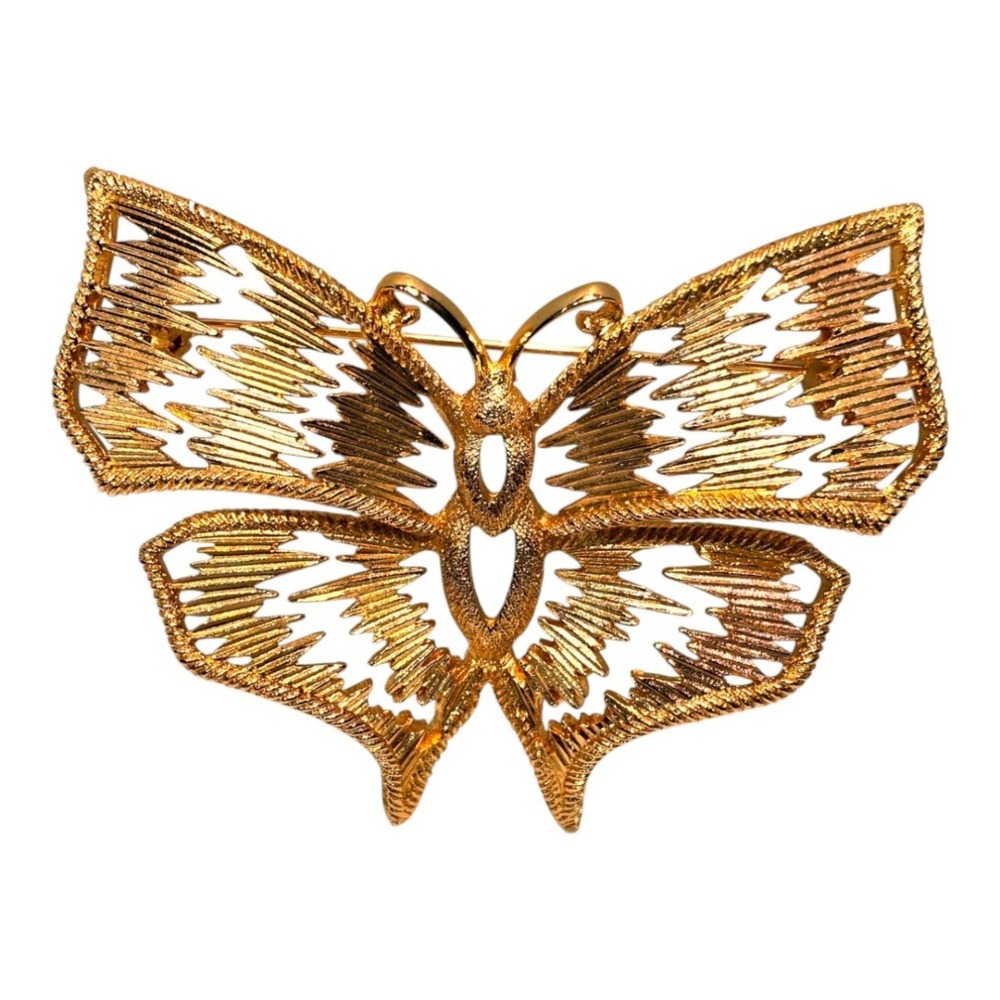 Christian Dior butterfly motif brooch accessory. Total weight: 33.4g. Metal.